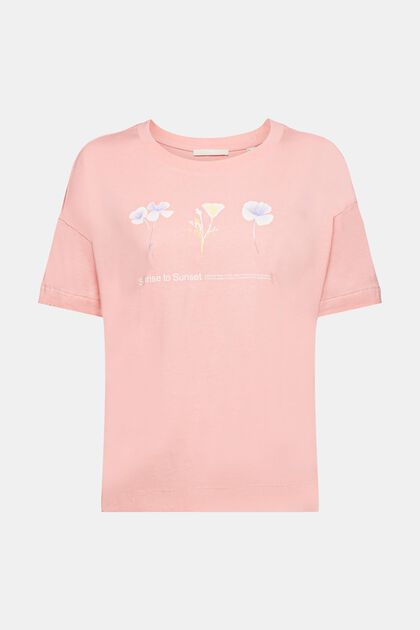T-paita, jossa on kukkakuviointi rinnan kohdalla